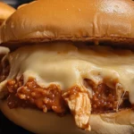 Family-Friendly & Flavor-Packed: Easy Cheesy Chicken Sloppy Joes 12 Close-up cheesy chicken sloppy joe sandwich